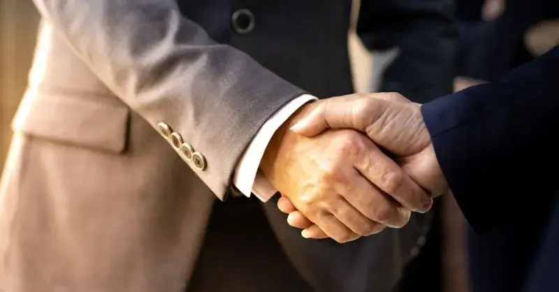 Two people shaking hands