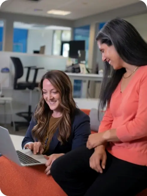 Two people working in an office