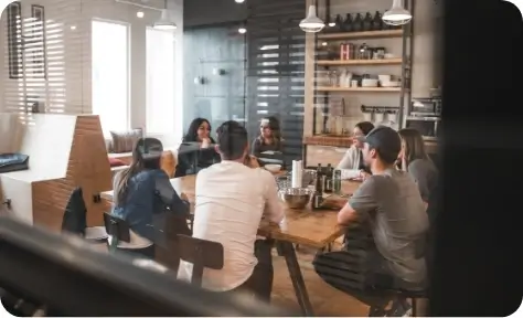 A work team sitting around a table