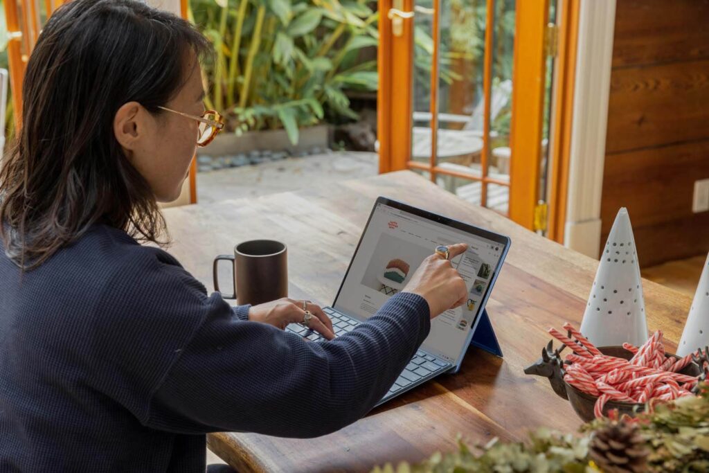 A woman using a laptop