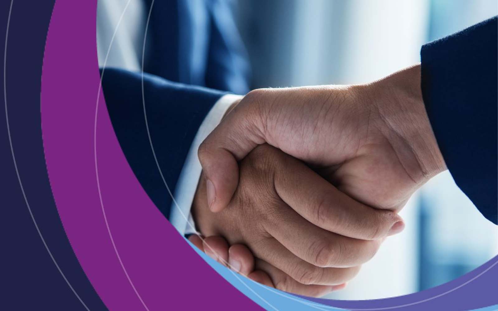 Two business people shaking hands