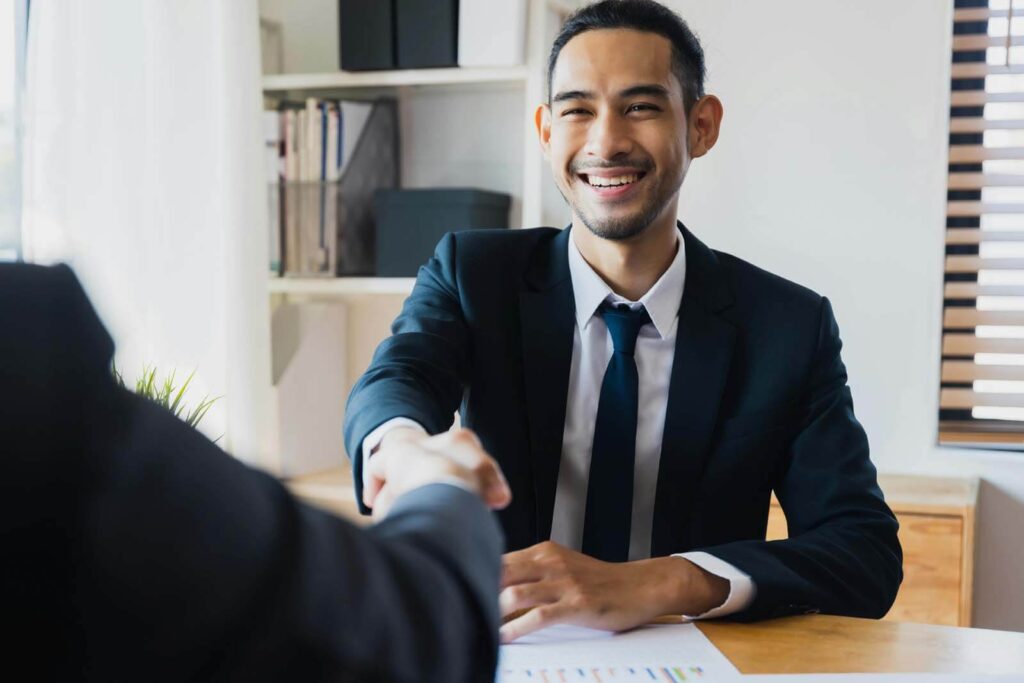 A professional shaking hands with a client